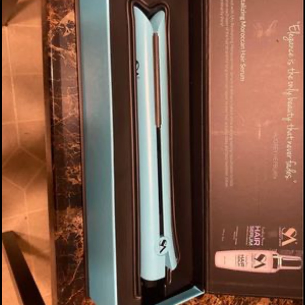 Straight ahead hair straightener silver collection.  Originally $300. Brand new